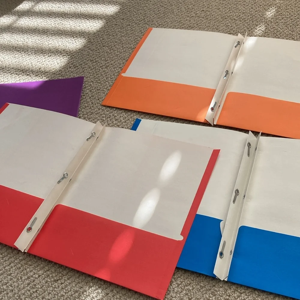 Unison 2 Pocket 3 Prong Folders Set of Four Assorted Colors With Dividers 4 Pack